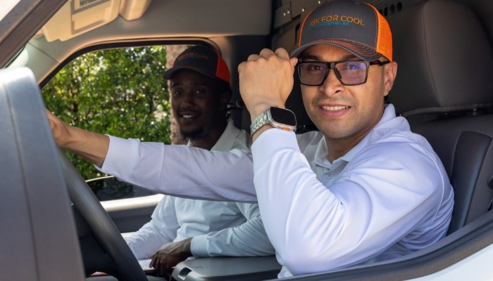 Technicians Smiling In Van Technicians Smiling In Van