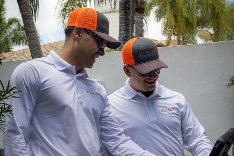 two-smiling-technicians